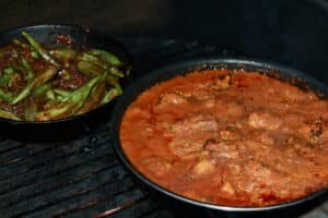 photo of Chicken tikka masala in a bowl on the bbq