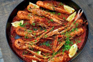 picture of cooked Langoustines in a tomato sauce