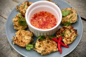 photo of Thai Fish Cakes on a plate with dipping sauce