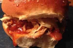 close up photo of BBQ Sauce in a bun