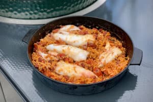 photo of Spanish style stuffed squid in a skillet pan