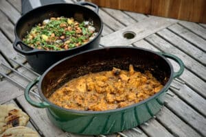 photo of large pot of mango chicken chilli on a table