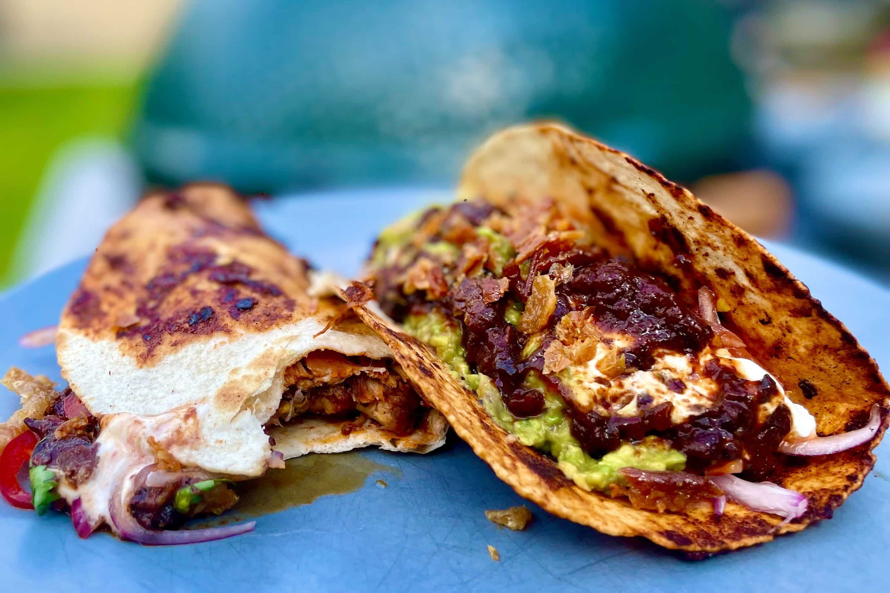 Chicken tacos with Adobo a photo of Chicken tacos with Adobo on a plate