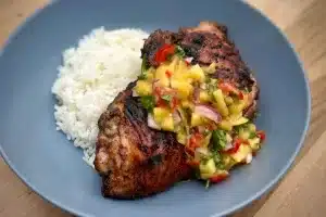 photo of spatchcock Jerk Chicken with rice in a bowl