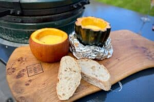 photo of Squash Fondue on a board with some bread for dipping
