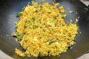 photo of Mushroom Rice in a wok
