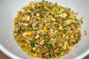 photo of Egg and veg fried rice in a white bowl
