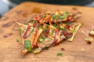 photo of Thai Pork Dumpling Nachos on a board