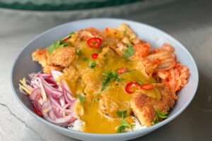 photo of Chicken Katsu with quick pickled red onions on the Big Green Egg