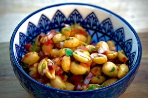 photo of Peanut Masala in a small blue and white dish