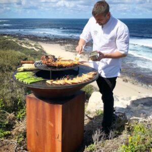 Ofyr Grill Round 100 close up beach shot